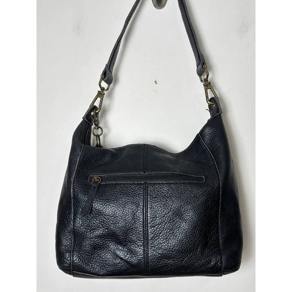 The Sak Alameda Hobo Bag Medium Black Pebbled Leather Feather Fringe Charm